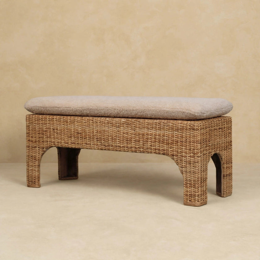 Side view of the Rattan Harmony bench showing the handwoven rattan detail
