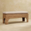 Rattan Harmony bench with cushioned seat in a living room