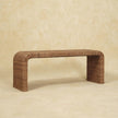 Side view of the rattan weave bench showing its mango wood frame