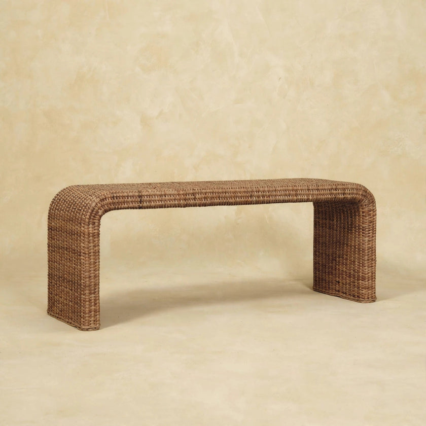Side view of the rattan weave bench showing its mango wood frame