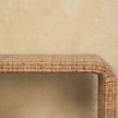 Rattan weave bench placed in a hallway-style interior