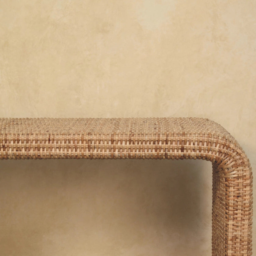 Rattan weave bench placed in a hallway-style interior
