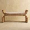 Boucle cushion seat of the rattan weave bench in a room setting
