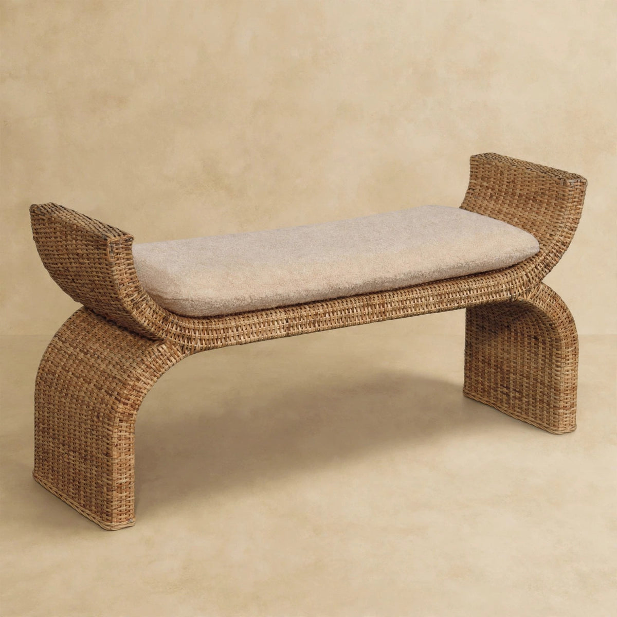 Rattan weave boucle bench styled as bedroom seating