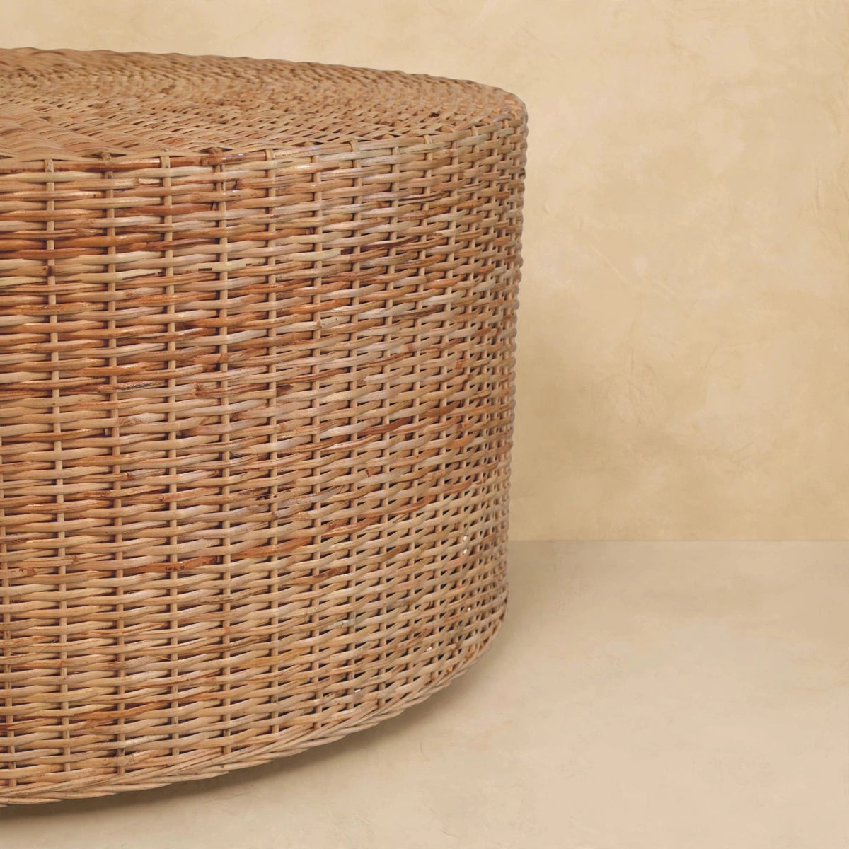 Close view of the woven exterior and circular top of the coffee table