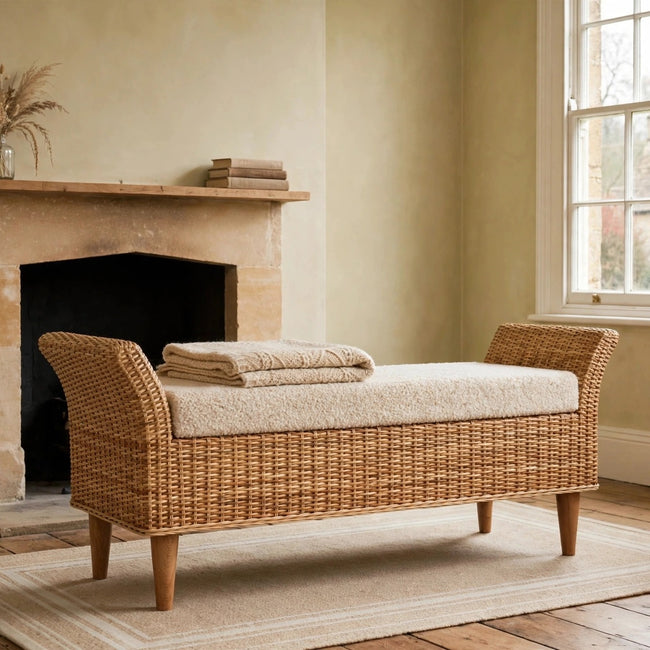 Riviera woven rattan bench with a cream boucle seat styled in a room