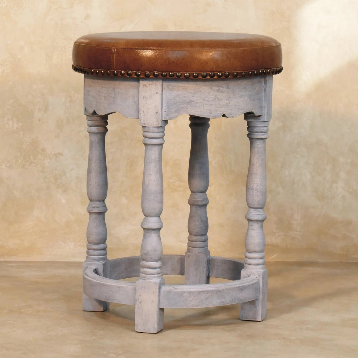 Rustic Charm stool used as accent seating beside other room furniture