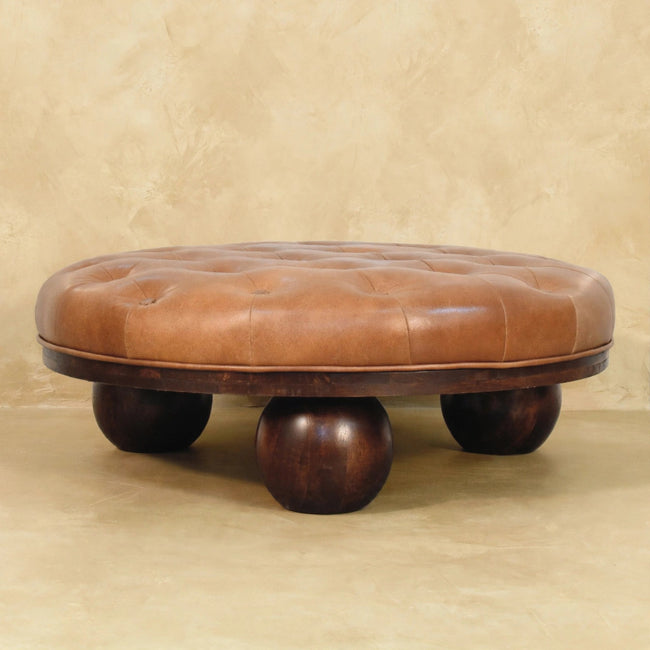 Sfera solid mango wood coffee table in California Walnut finish in a living room