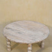 Close view of the rounded tabletop and wood grain on the Salted Oak coffee table