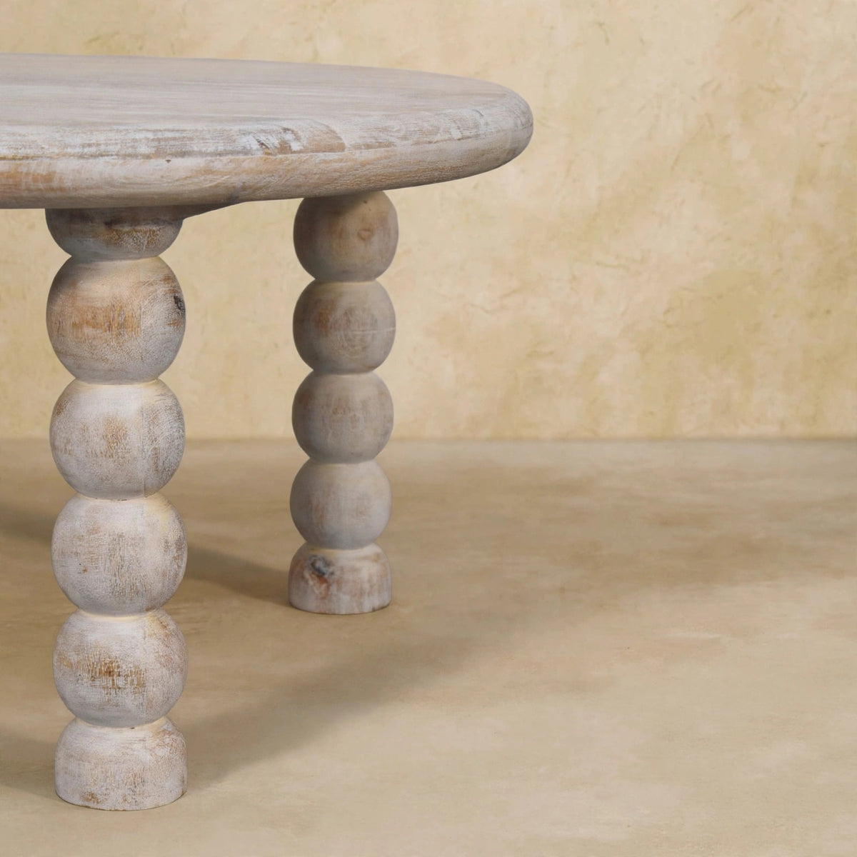 Salted Oak mango wood coffee table as a centerpiece in a living space