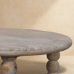 Turned spindle legs of the Salted Oak coffee table in a styled room