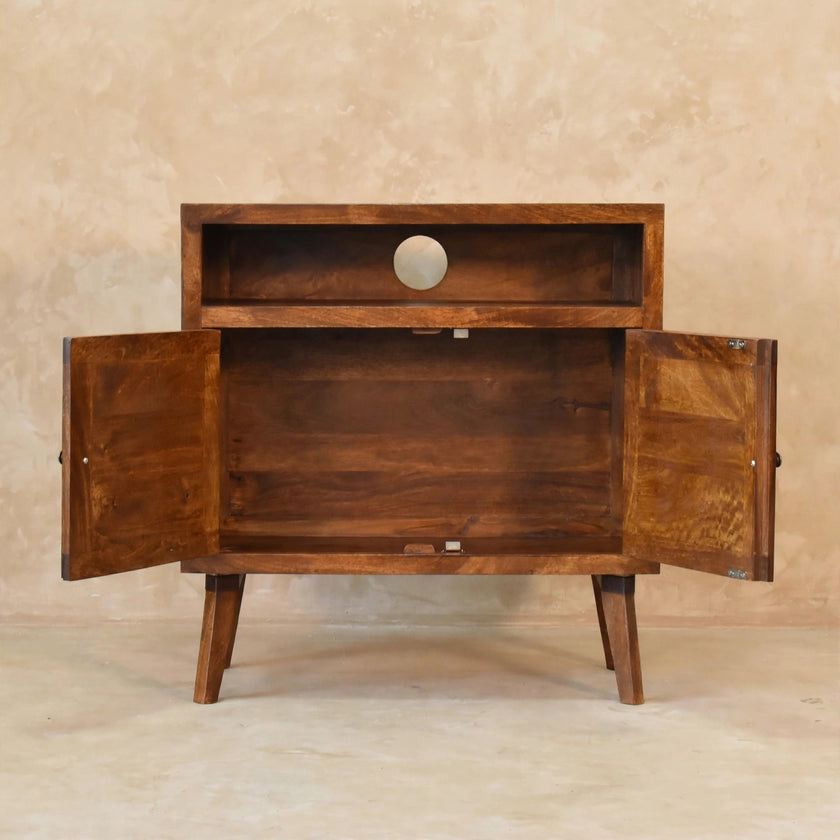 Tova open shelf cabinet styled with decor in a living room