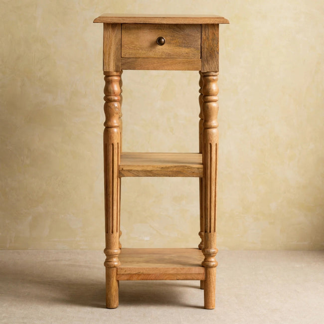 Mango wood telephone table with one drawer and two shelves in a room setting