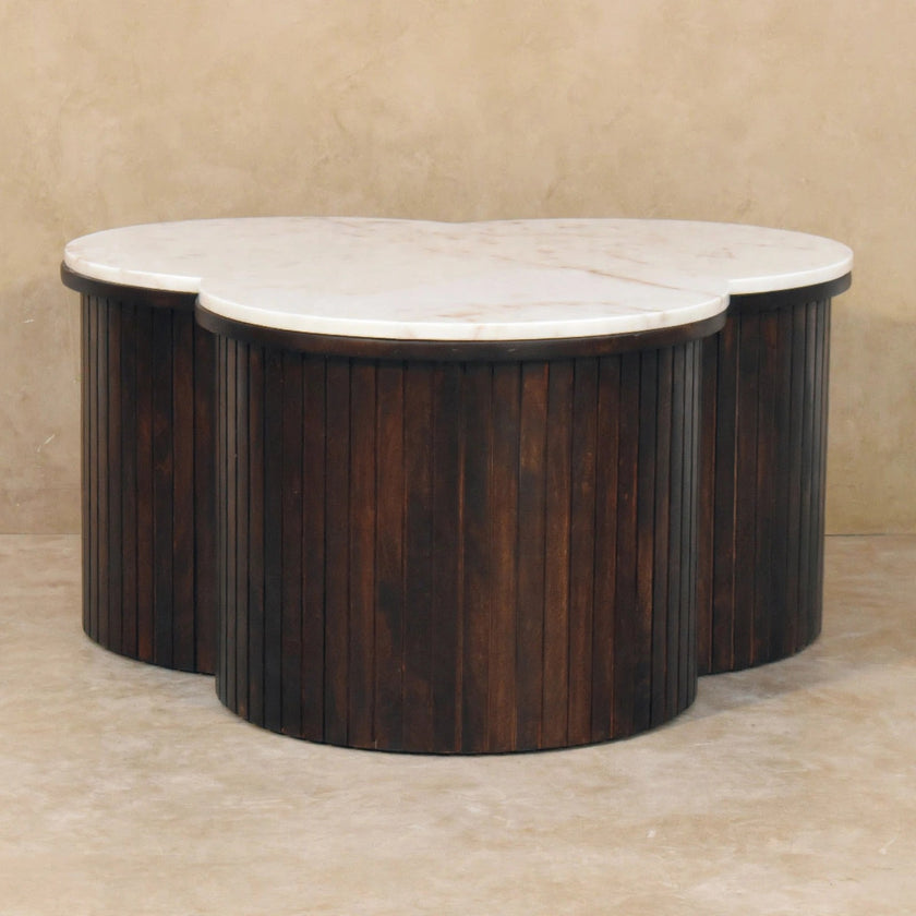Clover-shaped Verona coffee table in a Velvet Mocha finish styled in a lounge