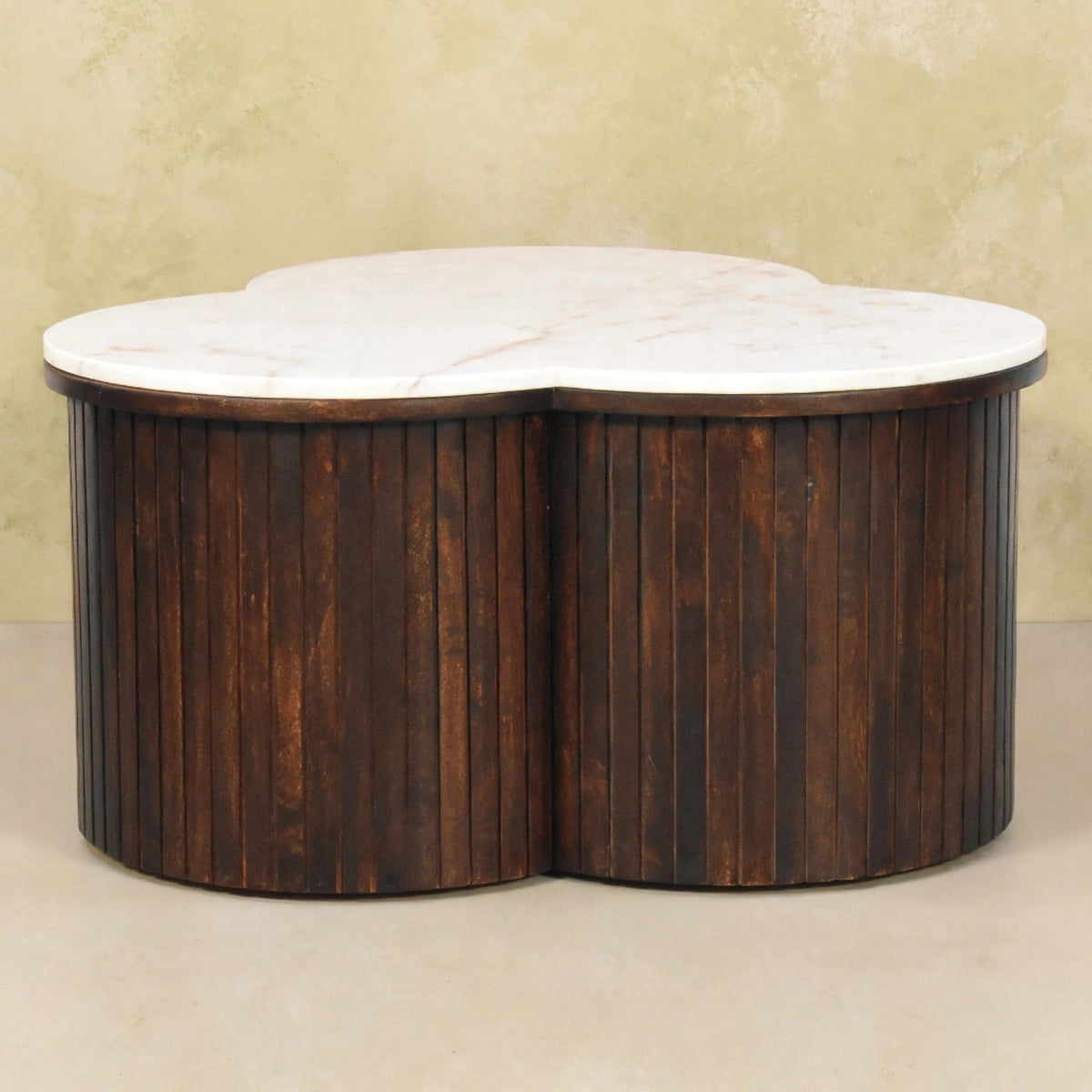 Side view of the Verona coffee table showing fluted detailing on the mango wood