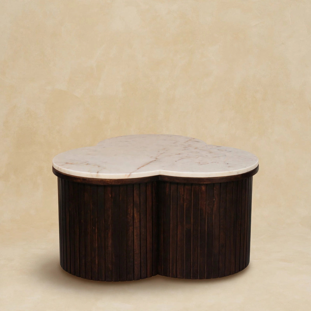 Verona marble coffee table placed in front of a sofa as a living room centerpiece